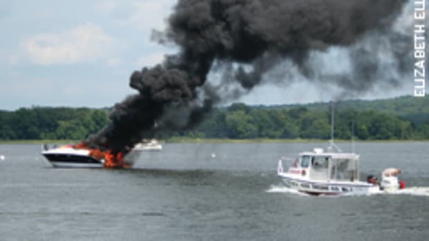 An afternoon cruise on the Connecticut River ended when a suspected engine fire burned out the hull and forced five people to abandon the powerboat.