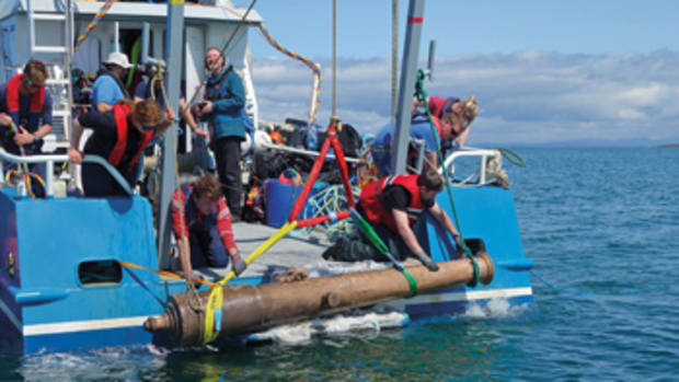Archaeologists recover a bronze cannon from La Juliana, a merchant ship that was part of the Spanish Armada when it sank in 1588.