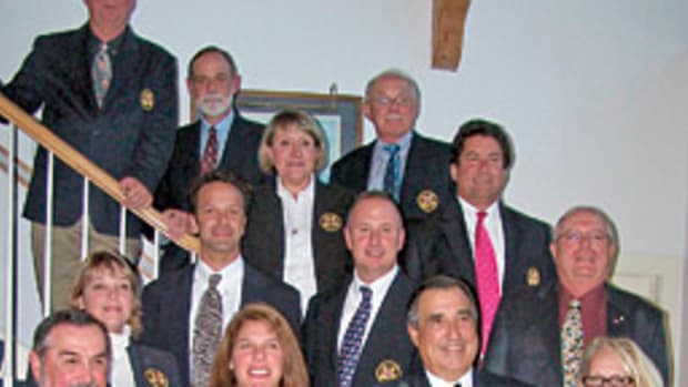 The new slate of officers for the Mystic River Yacht Club pose in formal yacht club attire after the annual meeting.