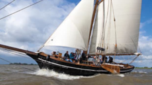 The 1853 revenue cutter Rigmor enjoys a blustery day on the Elbe River.