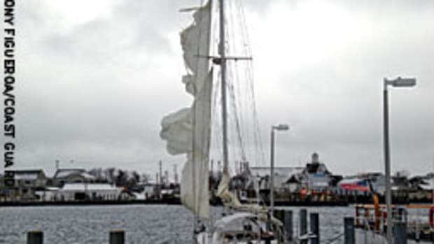 The sailing vessel Moonshine is pictured at the dock at Coast Guard Station Montauk, N.Y., after the Coast Guard rescued a four-person crew caught in an offshore storm that shredded the sails.