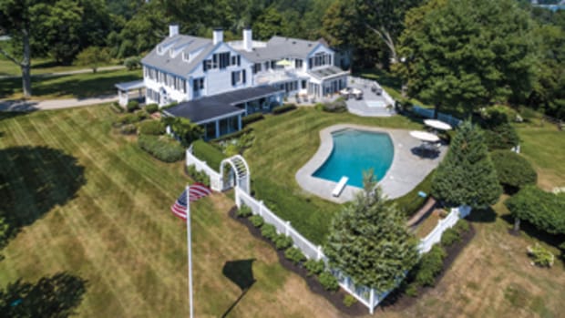 This 6,600-square-foot home on Duxbury Harbor includes an inground pool.