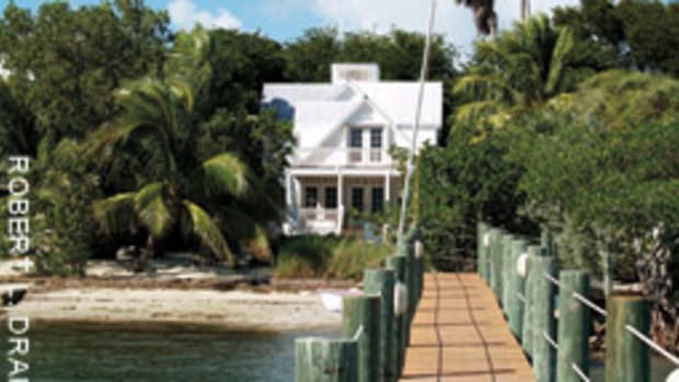 This five-bedroom home in the Florida Keys has a 300-foot dock with a boat lift and a free-form swimming pool ansd spa.