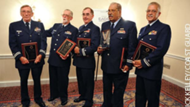 Five Coast Guard Auxiliarists were given the AFRAS Silver Medal for saving a stricken man aboard a runaway jonboat.