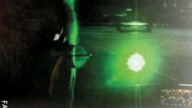 This images shows a green laser as seen by a pilot.