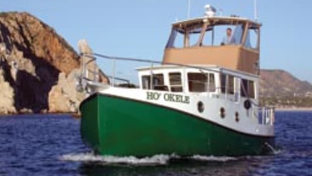 The writer pilots Ho'Okele from the flybridge along Mexico's Pacific Coast.
