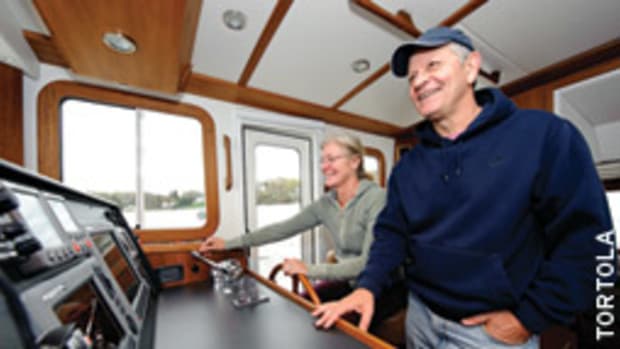 Kevin and Donna Steele cruise on their Nordic Tug, Carefree.