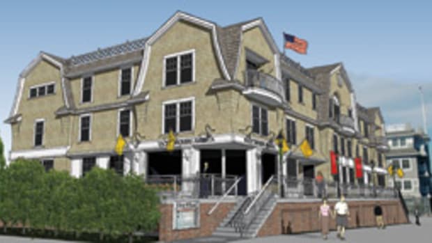 The shingle-style building is designed to blend with its historic neighborhood.