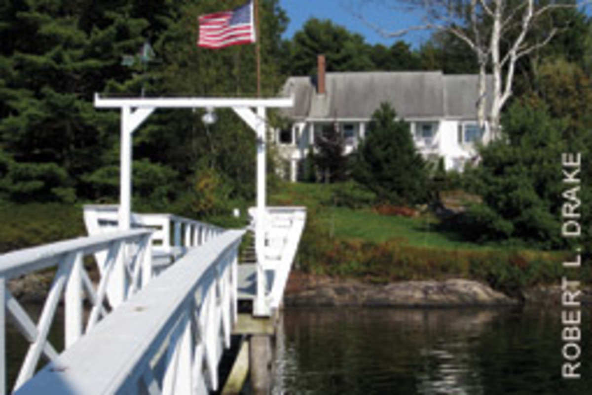The three-bedroom cape has a dock with unobstructed access to the Sheepscot River and the Atlantic.