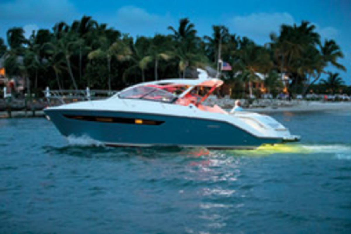 The Pursuit SC 365i conceals its outboards in a compartment at the transom.