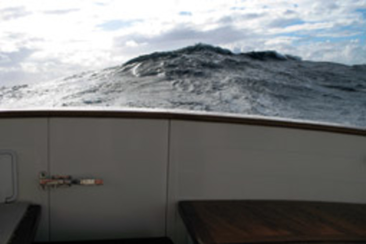 Slowing to displacement speed may be your best option in rough seas with breaking waves.