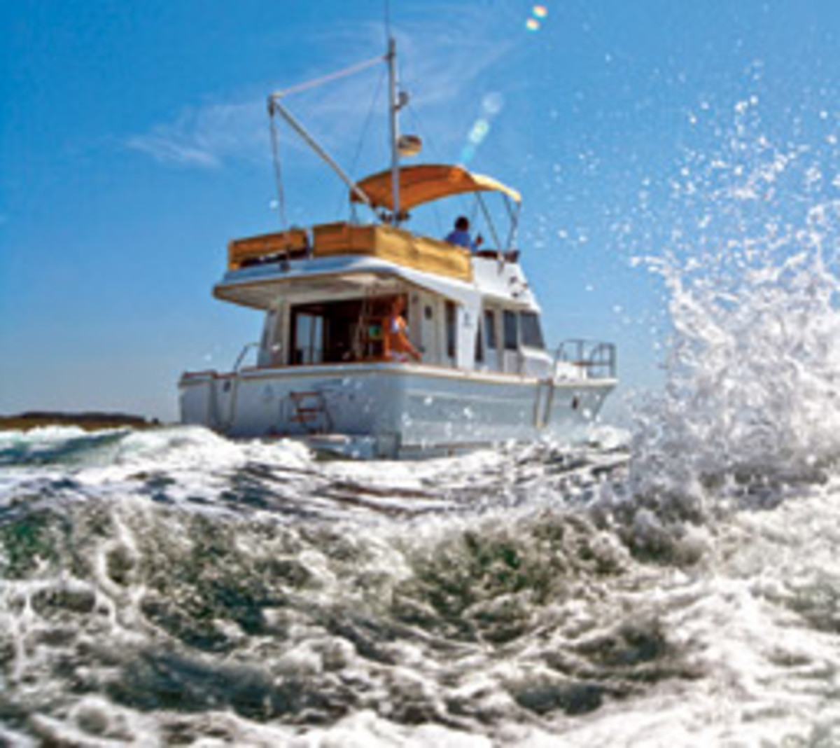 This Beneteau Swift Trawler delivers comfortable long-range cruising at a brisker pace.
