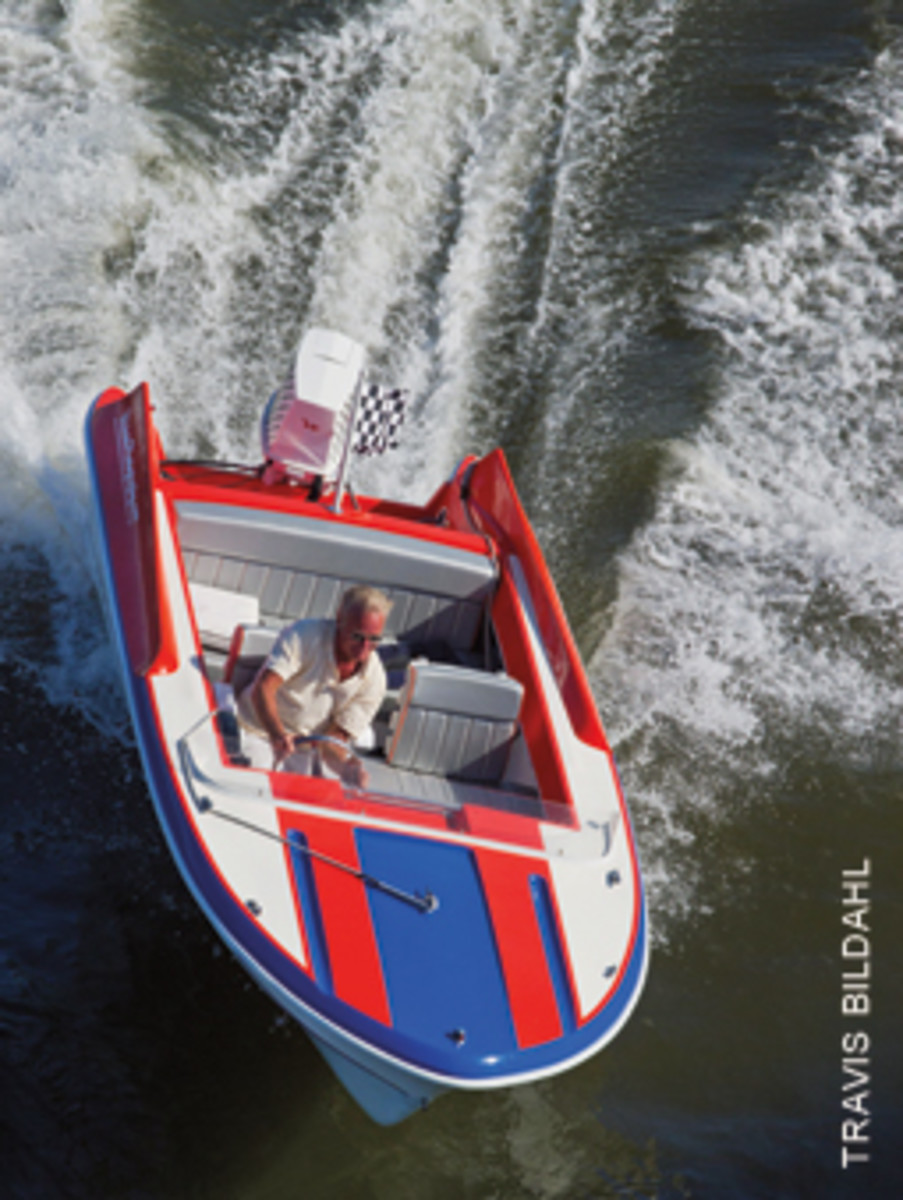 The classic fiberglass runabout's reverse chines and lifting strakes put some pep in her performance,