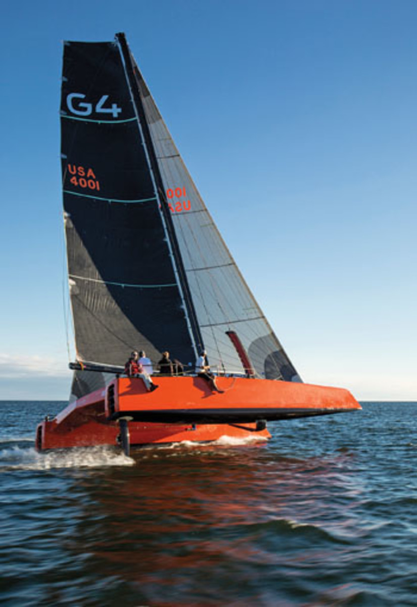 The Gunboat G4 in skimming mode, pushing approximately 20 knots and showing the L-shaped daggerboard under the windward hull.