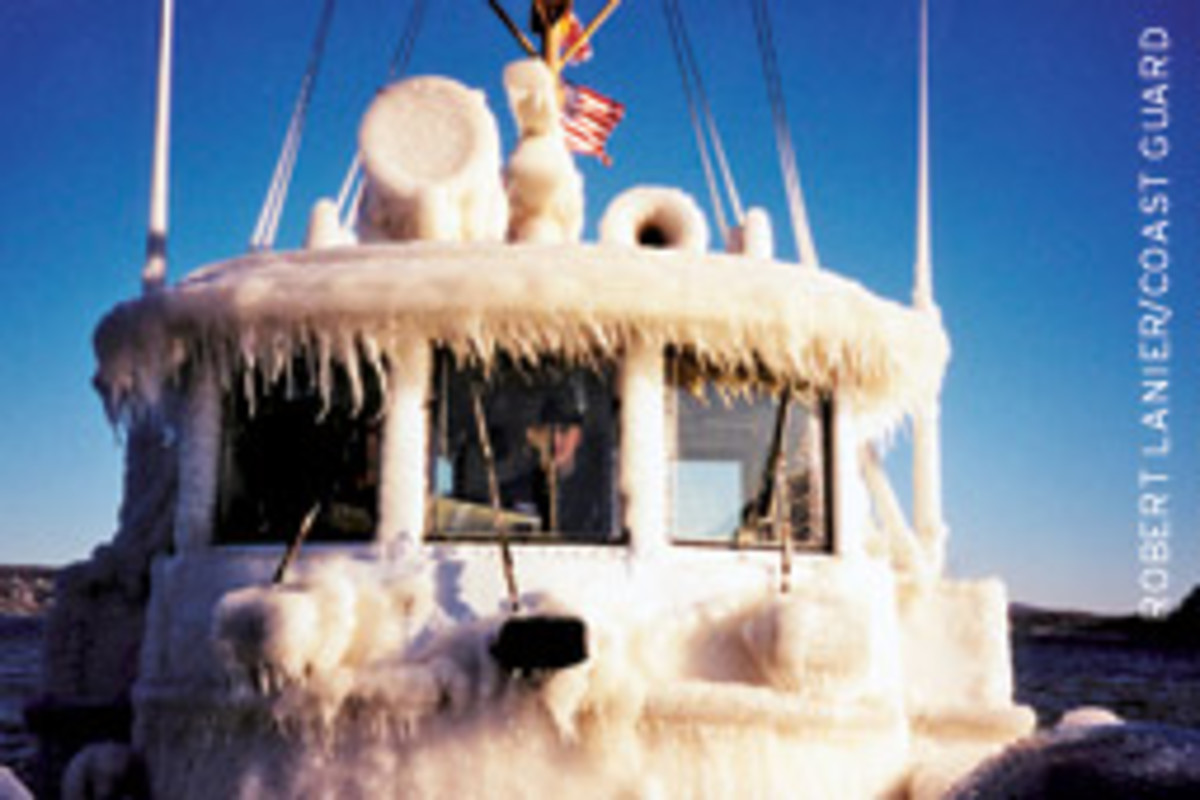 The icing aboard this Coast Guard harbor tug's pilothouse shows how the vessel could become top-heavy.