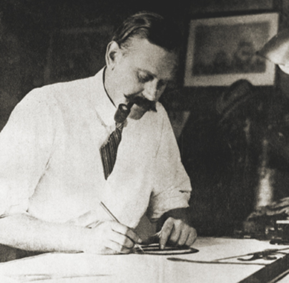 L. Francis at his drafting board at Burgess, Swasey and Paine in 1925.