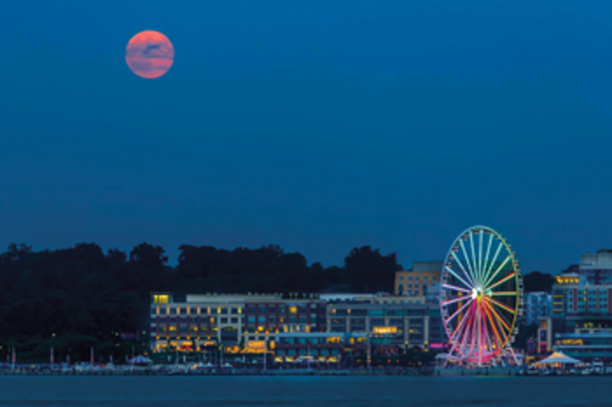 The Capital Wheel at National Harbor lifts visitors 180 feet for fantastic views of Washington, D.C.’s landmarks and monuments.