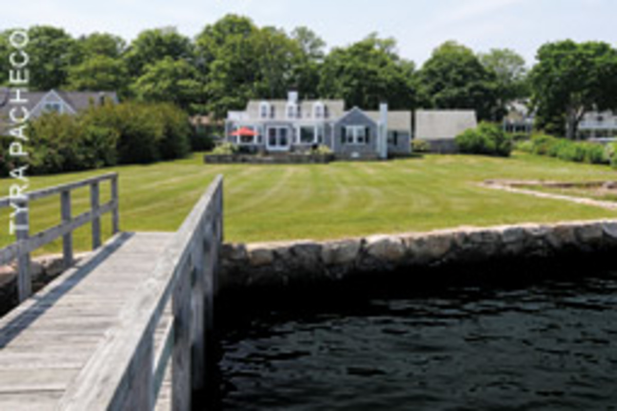 This home in Marion, Mass, has a bulkheaded waterfront and a private dock.