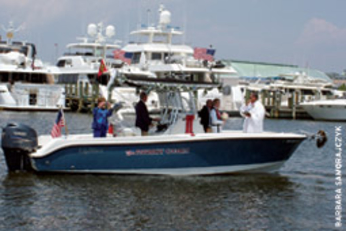 The theme was distinctly nautical when a Maryland couple wed aboard their 24-foot EdgeWater center console.