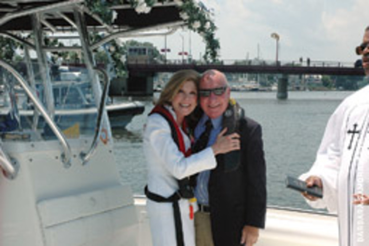 The theme was distinctly nautical when a Maryland couple wed aboard their 24-foot EdgeWater center console.