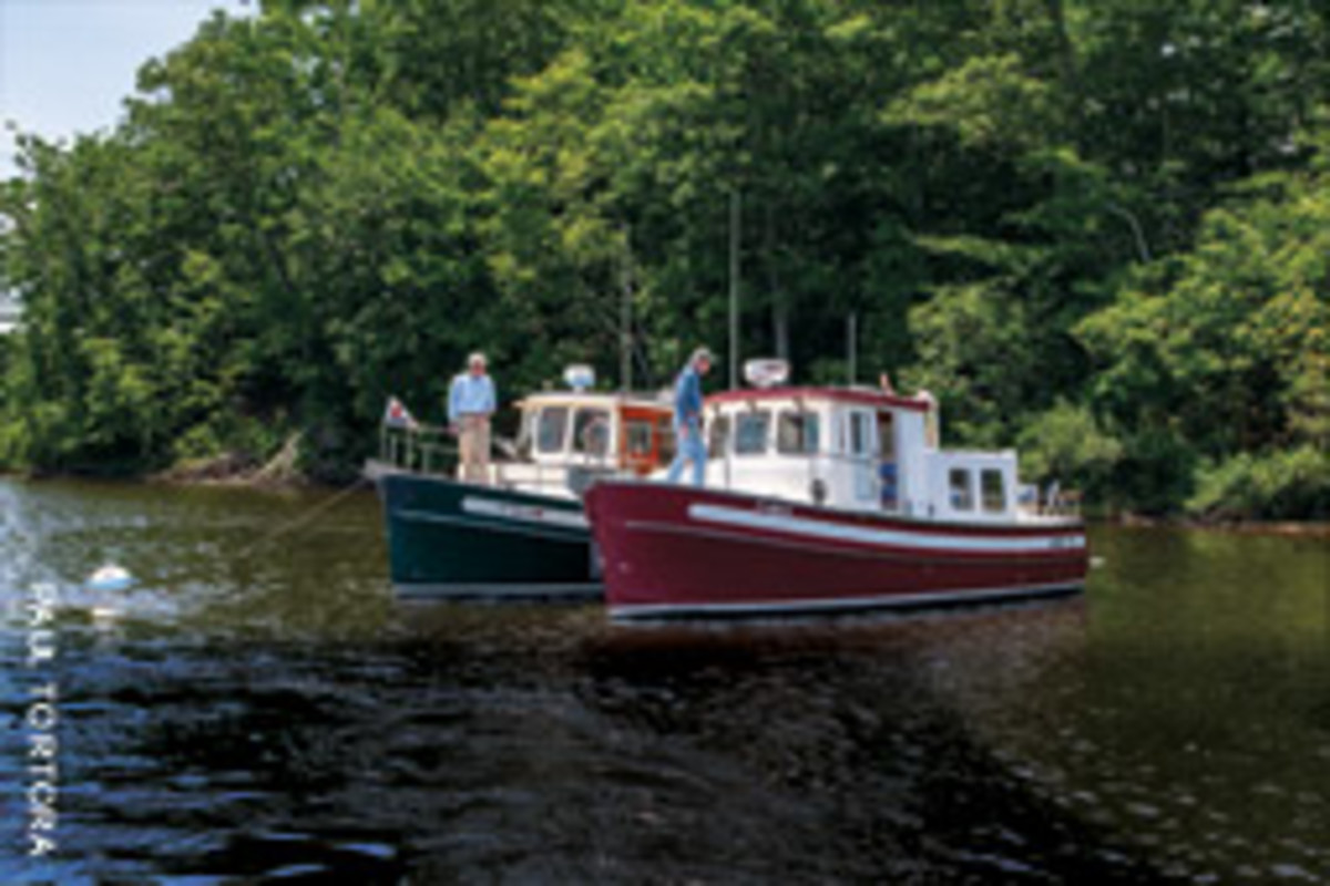 Connecticut boaters Geoffrey Balshaw (left) and Bill Bucknall each switched from sailboats to a Nordic Tug 26.