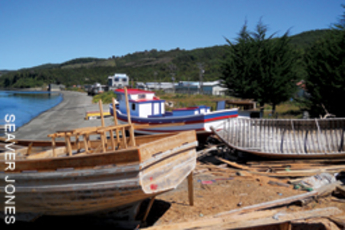 Boatbuilders set up shop on the beach on Chiloe, an island off Chile.