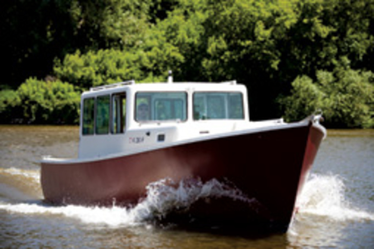 The slender Eco-Trawler 33 has a beam of 8 feet, 6 inches and a cruising speed of 13 to 15 knots.
