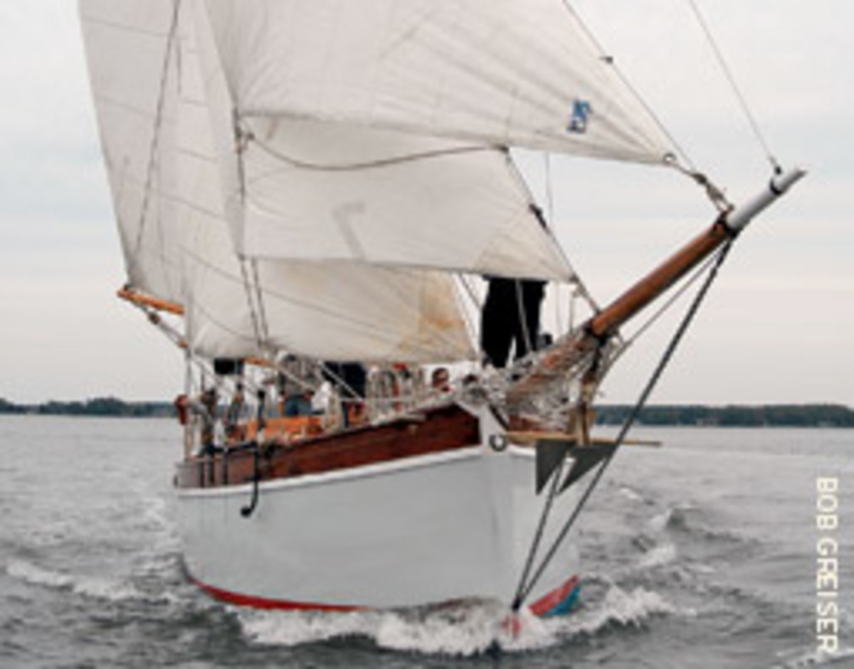 Rosalind's bowsprit crashed repeatedly into the waves, pounding the boat and her crew.