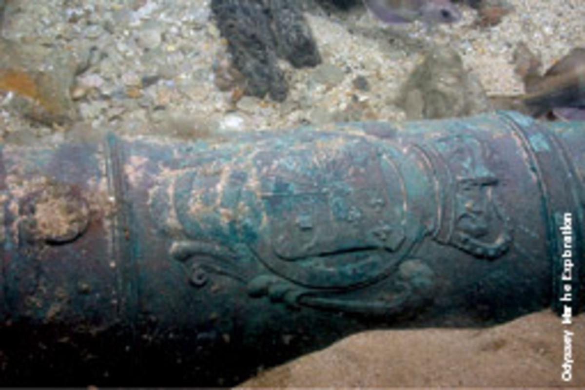 This bronze cannon from the HMS Victory wreck site bears the royal crest of King George I.