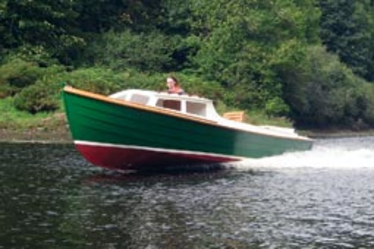 The Ninigret 22 was designed by John Atkin. The well for the outboard gives the boat a clean look.