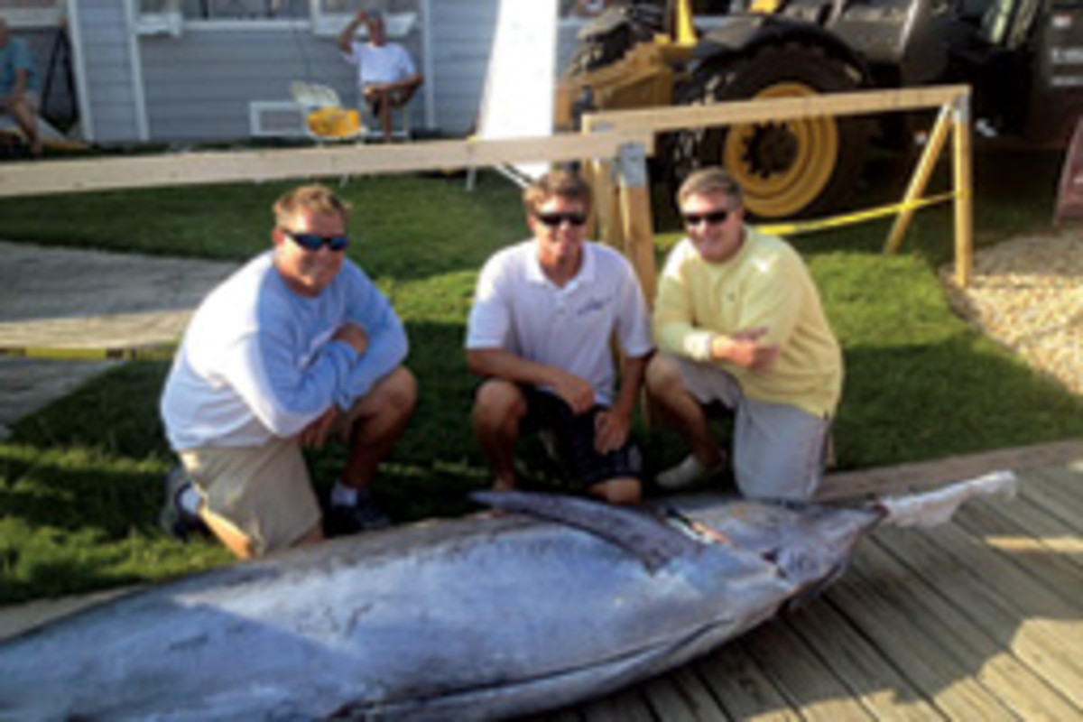 The Spencers are passionate anglers. Shown here are (from left) Cliff, Daniel and their father Paul.