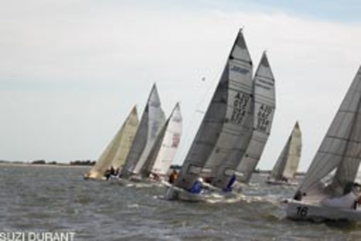 The racing was near ideal for this year's Charleston Race Week. Among the young sailors taking to the sport is Riley Chadwick, 12, aboard the No. 6 boat, Cujo (center).