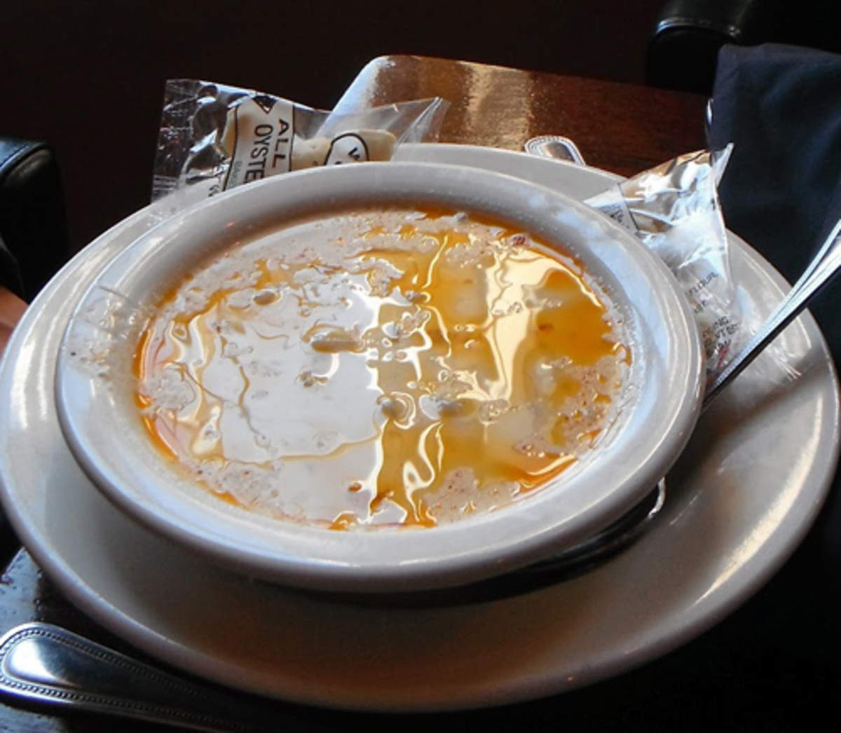 The clam chowder at The Grog in Newburyport, Massachusetts, is renowned in the region. Note how the butter floats on the surface of the creamy broth.
