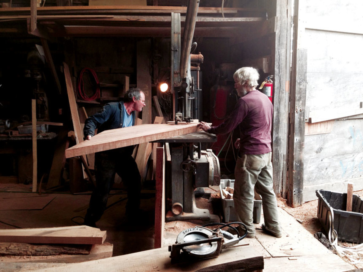 Andy Lyons (left) and Ross Gannon conspire on an angelique floor timber.