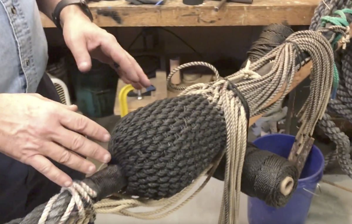 Mystic Seaport's head rigger crafts a mouse for the Mayflower II's mizzen stay. 