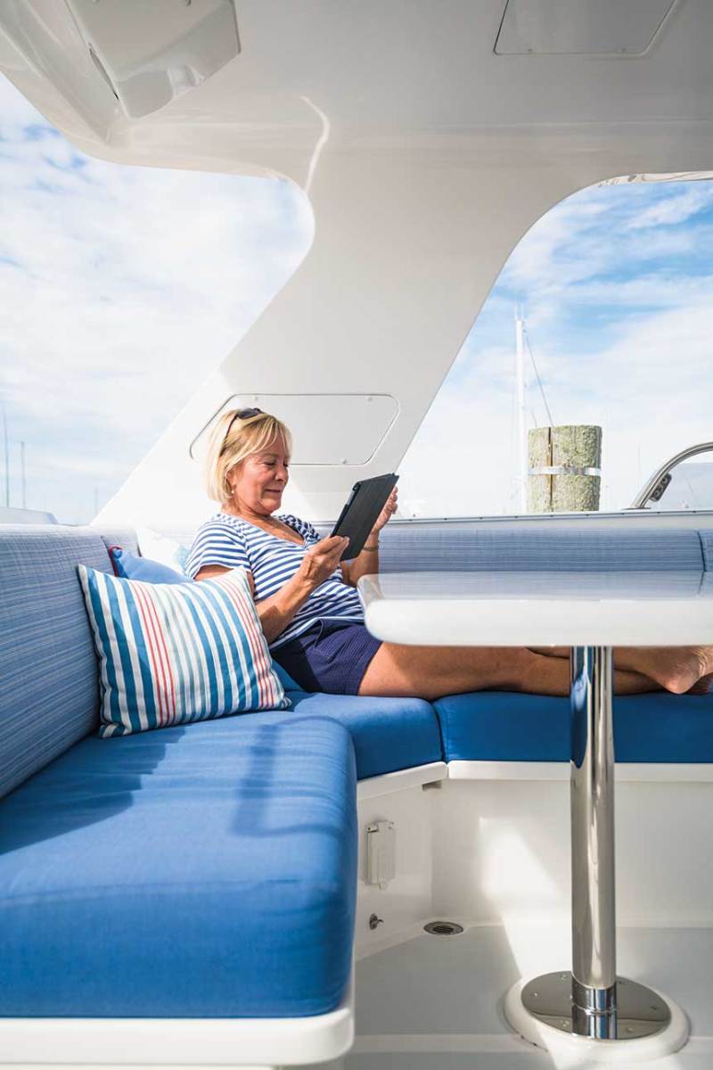 Sandy relaxes on the boat’s expansive flybridge.