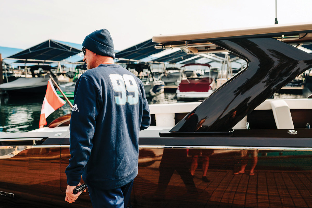 Gretzky inspects the boat at its launching.