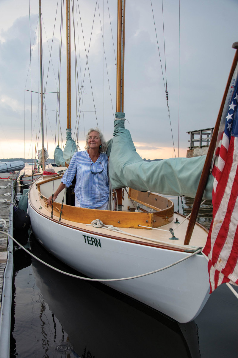 Pat Mundus poses on her personal boat, the Rozinante ketch, Tern.