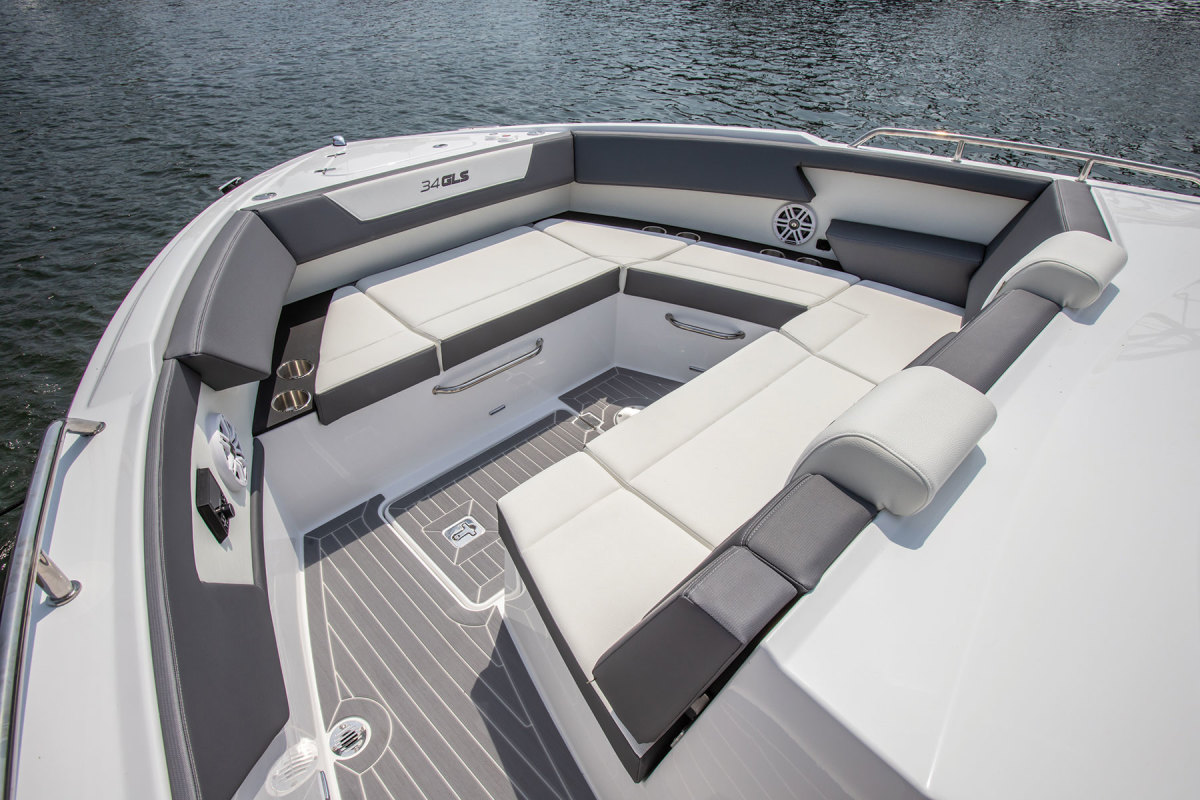 The bow with its U-shaped lounge and room for a table is one of multiple social zones on the Cruisers 34. 