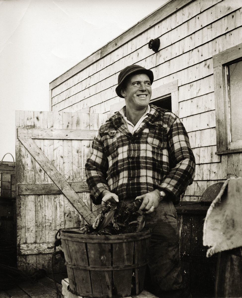 Lobsterman Glendon Lowe of Corea, Maine, is seen in a December 1953 photograph that appeared in the Atlantic Fisherman. The publication was founded in Boston in 1919 as “a paper for fishermen—producers—the men who actually fish for a living.” Its photo collection was donated to the Penobscot Marine Museum in the 1990s and provides an unmatched look at fishing on the Maine-Massachusetts coast in the 50 years after engines replaced sails. Atlantic Fisherman eventually morphed into National Fisherman and was then bought by Maine Coast Fisherman. In 2012, the owners of National Fisherman donated their pre-digital photo archive to PMM, thus giving the museum a visual timeline of American fisheries in the 20th century.