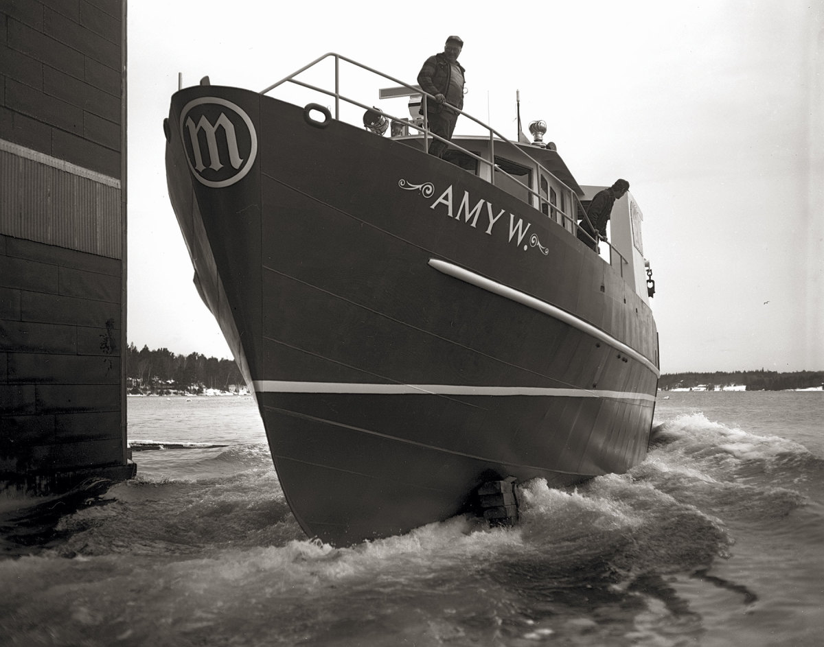A 1981 photograph by Everett “Red” Boutilier shows the 68-foot steel stern dragger Amy W. slipping down the ways at the Edward T. Gamage Yard in South Bristol, Maine. For about 40 years, Boutilier, a freelance photographer and journalist, shot every boat launch in Maine’s Midcoast region. Some of the Gamage Yard’s most celebrated builds were Harvey F. Gamage’s wooden sailing vessels from the 1950s and 1960s, including the 108-foot square topsail schooner Shenandoah, the 94-foot schooner Bill of Rights and Pete Seeger’s Hudson River sloop Clearwater. Boutilier died in 2003 at age 85. The Penobscot Marine Museum bought his 20,000 negatives and prints from his son and has digitized the collection and put it online.